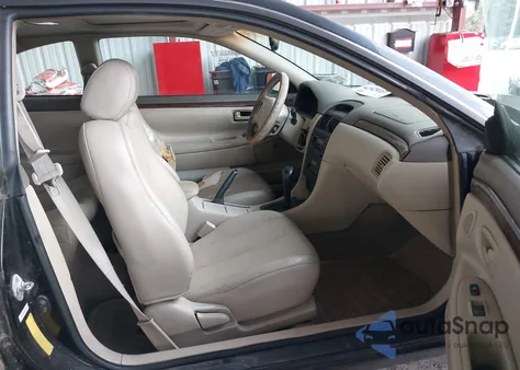 1999 Toyota Camry Solara Sle z USA, uszkodzony, nr VIN 2T1CF28P9XC212369